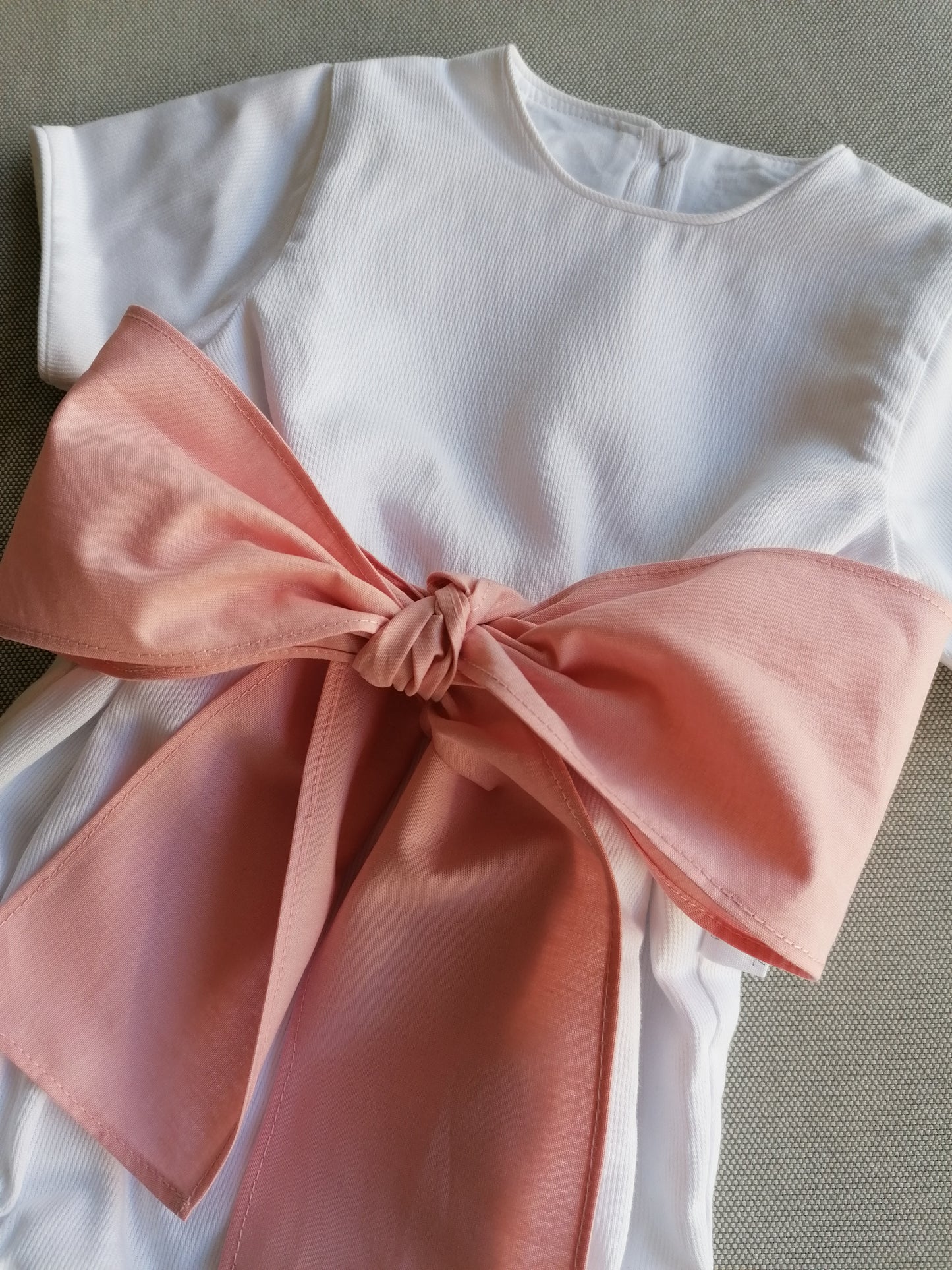 Fofo com laço rosa